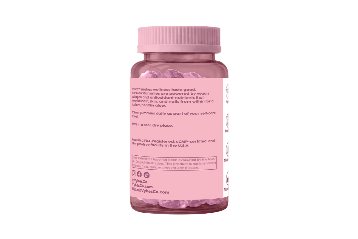 Pink supplement bottle with visible text on a white background