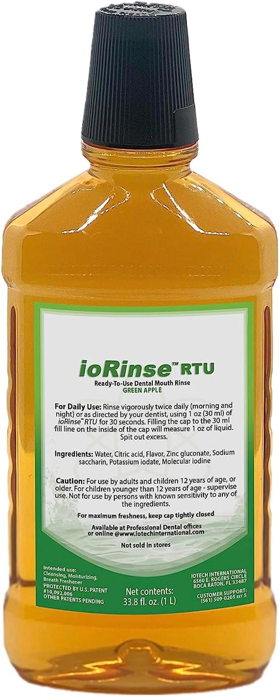 Clear yellow-green bottle of ioRinse RTU green apple dental mouth rinse with black cap, ingredient and instruction label visible.